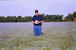 Mark Hylden in a Field of Flax