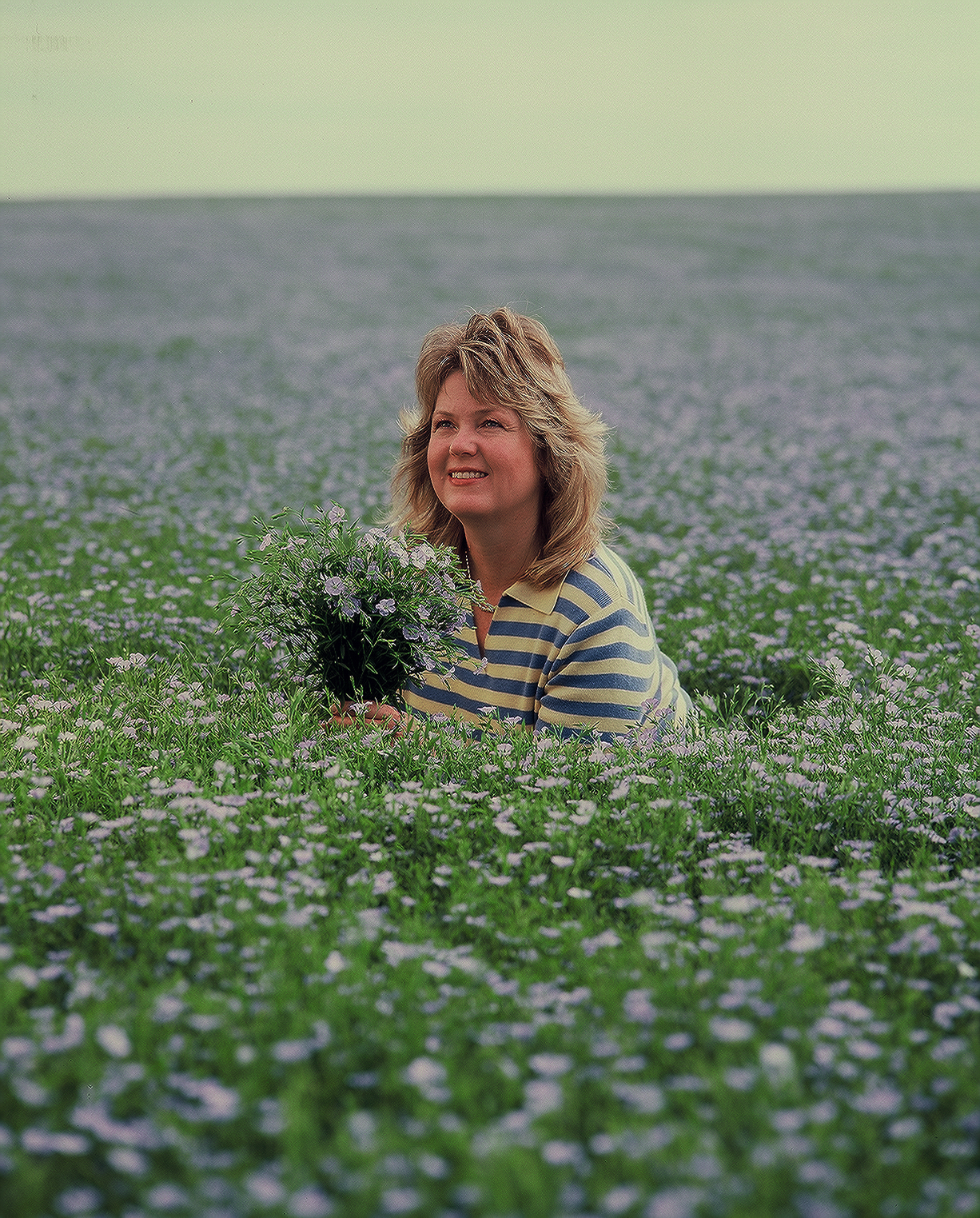 Beautiful Esther in flax field