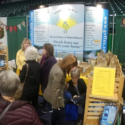 Esther helping customers with Golden Valley Flax